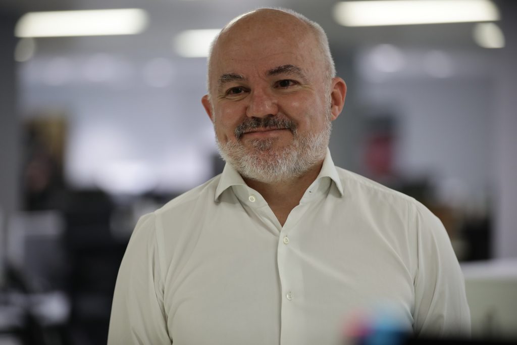 Mark Glover in a white shirt